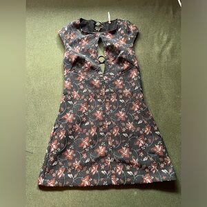 Backless black dress, floral design, zips on the side, open in the front